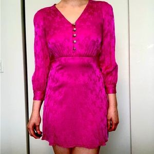 Kate Spade pink dress with bow and crystal details.